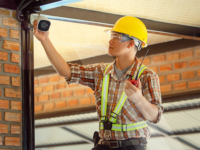 Alarm Technician installing camera